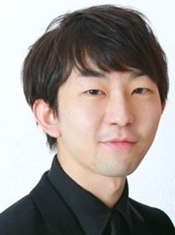 講義中に笑顔を見せるリップグリップ岩永学長